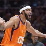 
              Phoenix Suns center JaVale McGee (00) reacts after being call for a foul during the second half of the team's NBA basketball game against the Utah Jazz on Friday, April 8, 2022, in Salt Lake City. (AP Photo/Rick Bowmer)
            