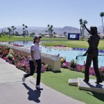
              Hinako Shibuno walks to the 18th hole during the second round of the LPGA Chevron Championship golf tournament Friday, April 1, 2022, in Rancho Mirage, Calif. (AP Photo/Marcio Jose Sanchez)
            
