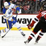 
              Buffalo Sabres right wing Tage Thompson (72) shoots as New Jersey Devils defenseman Damon Severson (28) defends during the second period of an NHL hockey game Thursday, April 21, 2022, in Newark, N.J. (AP Photo/Bill Kostroun)
            