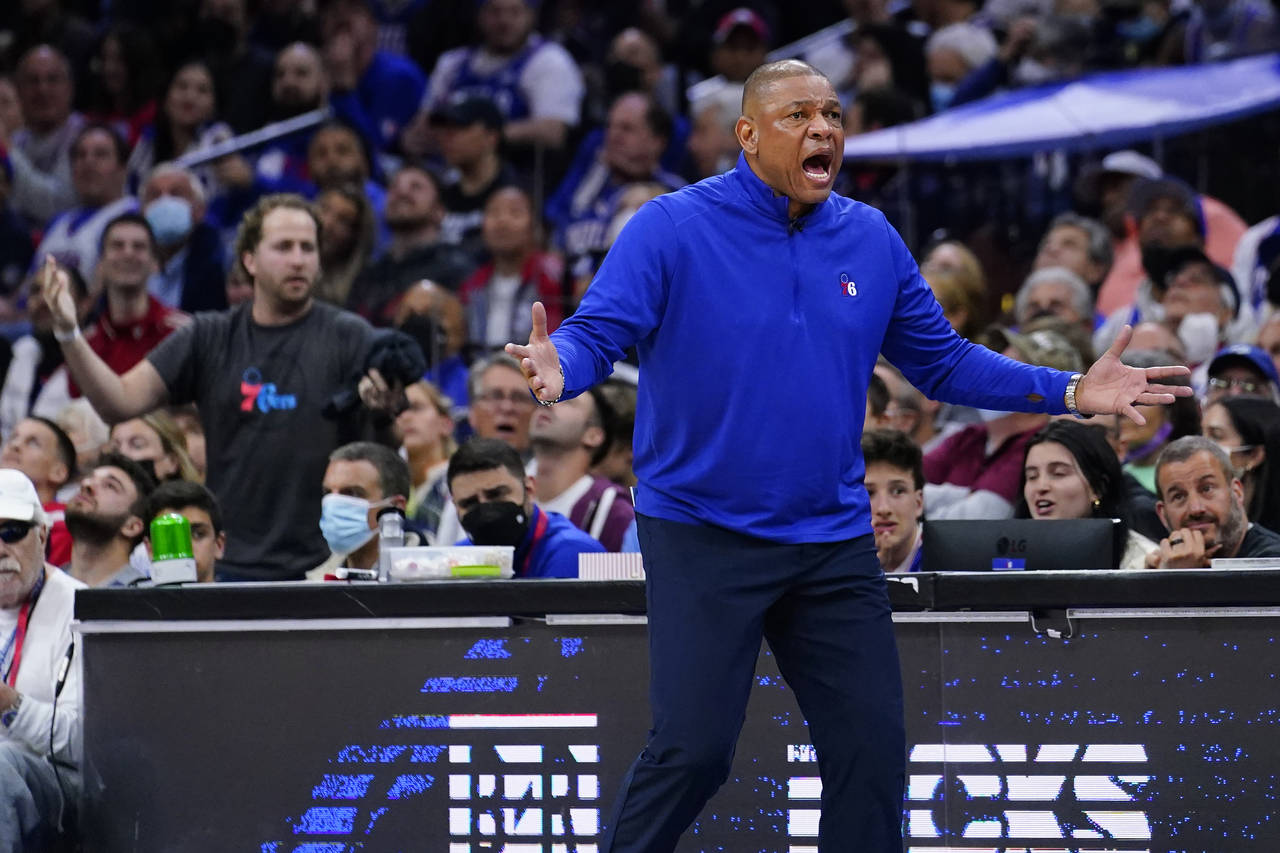 Philadelphia 76ers' Doc Rivers reacts during the second half of Game 2 of an NBA basketball first-r...
