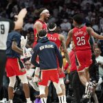
              Members of the New Orleans Pelicans celebrate as time runs out in an NBA basketball play-in tournament game against the Los Angeles Clippers Friday, April 15, 2022, in Los Angeles. The Pelicans won 105-101. (AP Photo/Mark J. Terrill)
            