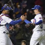 
              Chicago Cubs catcher Willson Contreras celebrates with relief pitcher David Robertson the team's 4-2 win over the Tampa Bay Rays after a baseball game Monday, April 18, 2022, in Chicago. (AP Photo/Charles Rex Arbogast)
            