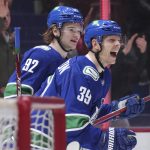 
              Vancouver Canucks' Alex Chiasson (39) and Vasily Podkolzin (92) celebrate Chiasson's goal against the Arizona Coyotes during the first period of an NHL hockey game Thursday, April 14, 2022, in Vancouver, British Columbia. (Darryl Dyck/The Canadian Press via AP)
            