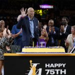 
              NBA Hall of Famer Kareem Abdul-Jabbar, center, celebrates his 75th birthday with other NBA legends and friends during half-time of an NBA basketball game between the Oklahoma City Thunder and the Los Angeles Lakers in Los Angeles, Friday, April 8, 2022. (AP Photo/Ashley Landis)
            