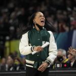 
              South Carolina head coach Dawn Staley reacts during the second half of a college basketball game in the final round of the Women's Final Four NCAA tournament Sunday, April 3, 2022, in Minneapolis. (AP Photo/Eric Gay)
            
