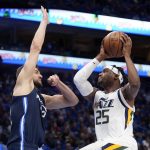 
              Dallas Mavericks forward Maxi Kleber, left, defends as Utah Jazz forward Danuel House Jr. (25) goes up to take a shot in the first half of Game 1 of an NBA basketball first-round playoff series, Saturday, April 16, 2022, in Dallas. (AP Photo/Tony Gutierrez)
            
