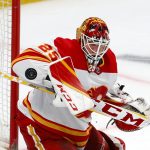 
              Calgary Flames goalie Jacob Markstrom (25) blocks a shot against the Los Angeles Kings during the third period of an NHL hockey game Monday, April 4, 2022, in Los Angeles. The Flames won 3-2. (AP Photo/Ringo H.W. Chiu)
            