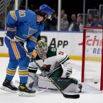 
              St. Louis Blues' Brandon Saad (20) scores past Minnesota Wild goaltender Cam Talbot during the second period of an NHL hockey game Saturday, April 16, 2022, in St. Louis. (AP Photo/Jeff Roberson)
            