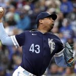
              Kansas City Royals starting pitcher Carlos Hernandez throws during the first inning of a baseball game against the New York Yankees Saturday, April 30, 2022, in Kansas City, Mo. (AP Photo/Charlie Riedel)
            