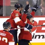 
              Florida Panthers left wing Anthony Duclair, left, celebrates with defenseman Brandon Montour, right, after Montour scored against the Toronto Maple Leafs in overtime of an NHL hockey game Saturday, April 23, 2022, in Sunrise, Fla. The Panthers won 3-2. (AP Photo/Lynne Sladky)
            