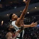 
              Milwaukee Bucks' Giannis Antetokounmpo shoots past Chicago Bulls' Patrick Williams during the first half of Game 1 of their first round NBA playoff basketball game Sunday, April 17, 2022, in Milwaukee . (AP Photo/Morry Gash)
            