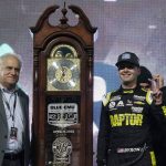 
              William Byron, right, and track president Clay Campbell, left, stand next to the trophy after Byron won the NASCAR Cup Series auto race at Martinsville Speedway on Saturday, April 9, 2022, in Martinsville, Va. (AP Photo/Steve Helber)
            