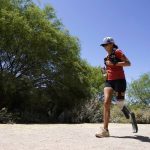 
              Jacky Hunt-Broersma runs her 102nd marathon in 102 days, this one at Veterans Oasis Park, Thursday, April 28, 2022, in Chandler, Ariz. (AP Photo/Ross D. Franklin)
            