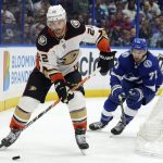 
              Anaheim Ducks defenseman Kevin Shattenkirk (22) carries the puck ahead of Tampa Bay Lightning center Anthony Cirelli (71) during the second period of an NHL hockey game Thursday, April 14, 2022, in Tampa, Fla. (AP Photo/Chris O'Meara)
            