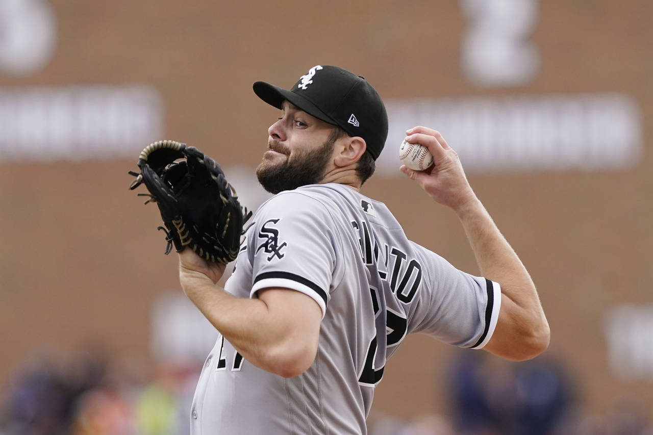 Chicago White Sox starting pitcher Lucas Giolito throws during the first inning of a baseball game ...