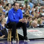 
              Duke head coach Mike Krzyzewski watches during the first half of a college basketball game against North Carolina in the semifinal round of the Men's Final Four NCAA tournament, Saturday, April 2, 2022, in New Orleans. (AP Photo/David J. Phillip)
            