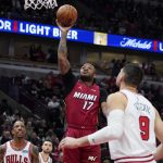 
              Miami Heat forward P.J. Tucker (17) shoots against the Chicago Bulls during the first half of an NBA basketball game in Chicago, Saturday, April 2, 2022. (AP Photo/Nam Y. Huh)
            