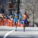 
              Peres Jepchirchir, of Kenya, left, and Ababel Yeshaneh, of Ethiopia, compete in the 126th Boston Marathon in Brookline, Mass., Monday, April 18, 2022. Jepchirchir won the race and Yeshaneh finished second. (AP Photo/Jennifer McDermott)
            