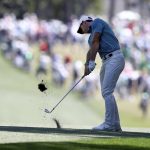 
              Rory Mcllroy hits his second shot on the first fairway during the final round of the Masters golf tournament, Sunday, April 10, 2022, in Augusta, Ga. (Curtis Compton/Atlanta Journal-Constitution via AP)
            