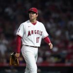 
              Los Angeles Angels starting pitcher Shohei Ohtani walks off the mound as he is replaced during the fifth inning of the team's baseball game against the Houston Astros on Thursday, April 7, 2022, in Anaheim, Calif. (AP Photo/Ashley Landis)
            