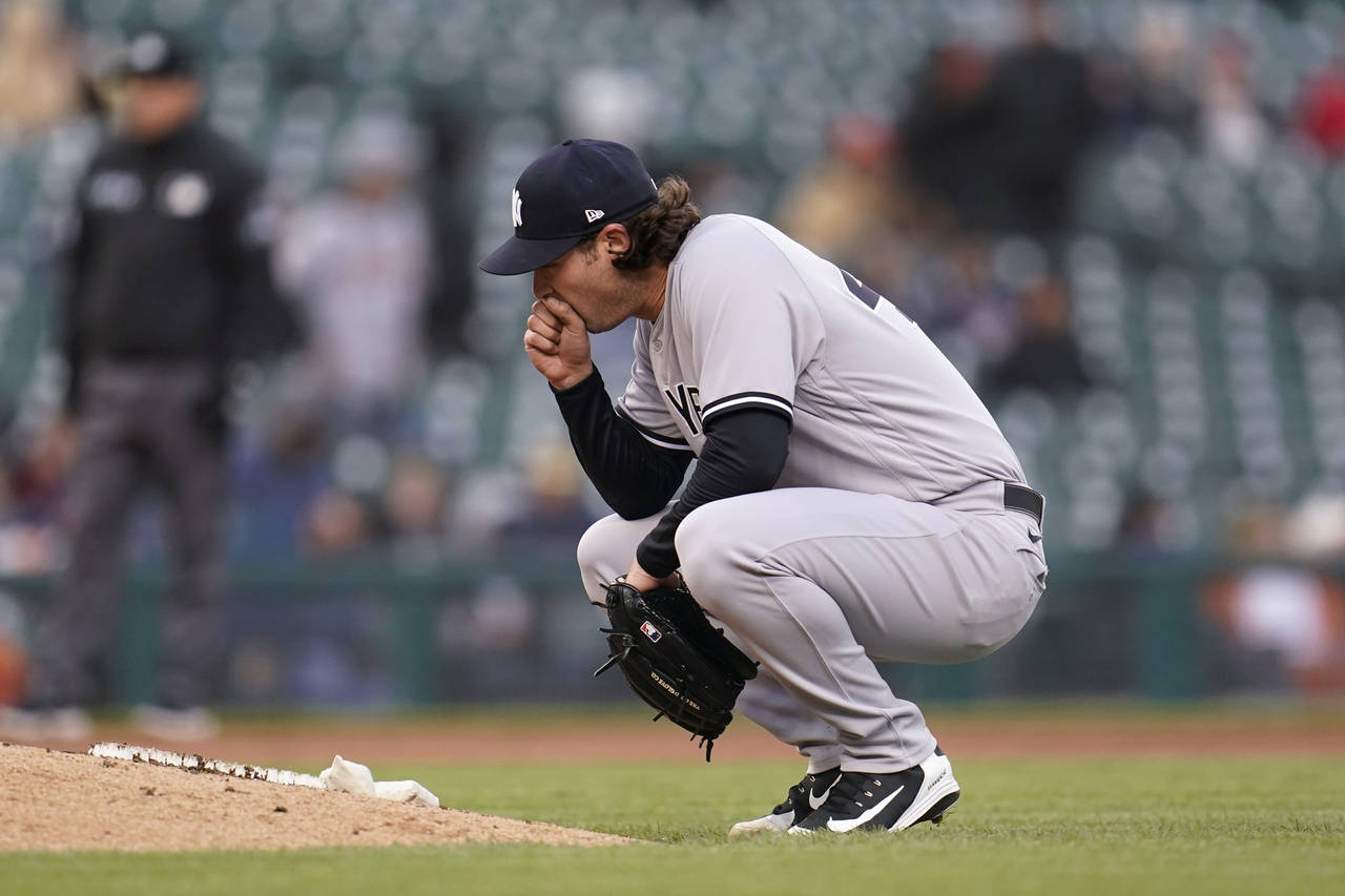 New York Yankees pitcher Gerrit Cole reacts after allowing a walk to Detroit Tigers' Willi Castro w...