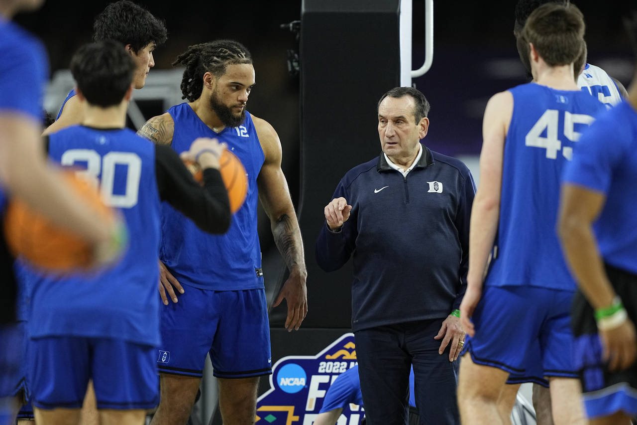 Duke head coach Mike Krzyzewski talks during practice for the men's Final Four NCAA college basketb...