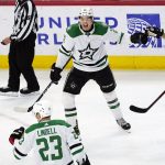 
              Dallas Stars left wing Jason Robertson, second from right, celebrates with center Joe Pavelski (16), and defensemen Esa Lindell (23) and John Klingberg (3) after scoring a goal against the Chicago Blackhawks during the second period of an NHL hockey game in Chicago, Sunday, April, 10, 2022. (AP Photo/Nam Y. Huh)
            
