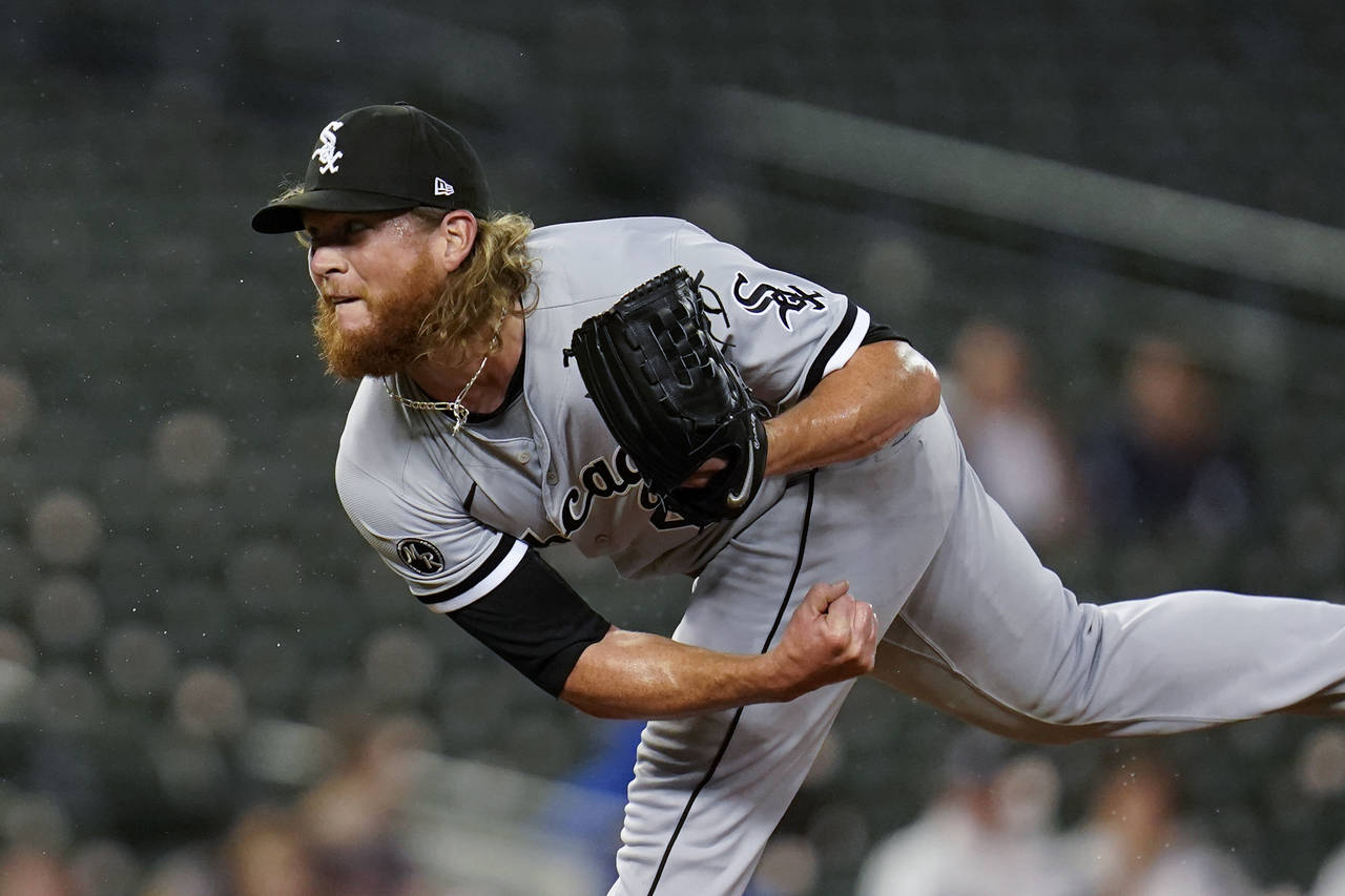 FILE - Chicago White Sox relief pitcher Craig Kimbrel throws against the Detroit Tigers in the eigh...