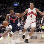 
              Philadelphia 76ers guard Tyrese Maxey (0) drives against Toronto Raptors forward Scottie Barnes (4) during the second half of Game 4 of an NBA basketball first-round playoff series, Saturday, April 23, 2022 in Toronto. (Nathan Denette/The Canadian Press via AP)
            