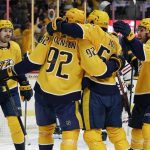 
              Nashville Predators' Roman Josi (59) is congratulated after scoring a goal against the Chicago Blackhawks in the second period of an NHL hockey game Saturday, April 16, 2022, in Nashville, Tenn. (AP Photo/Mark Humphrey)
            