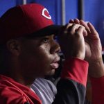 
              Cincinnati Reds starting pitcher Hunter Greene adjusts his cap as he sits in the dugout after the fifth inning of a baseball game against the Los Angeles Dodgers Saturday, April 16, 2022, in Los Angeles. (AP Photo/Mark J. Terrill)
            