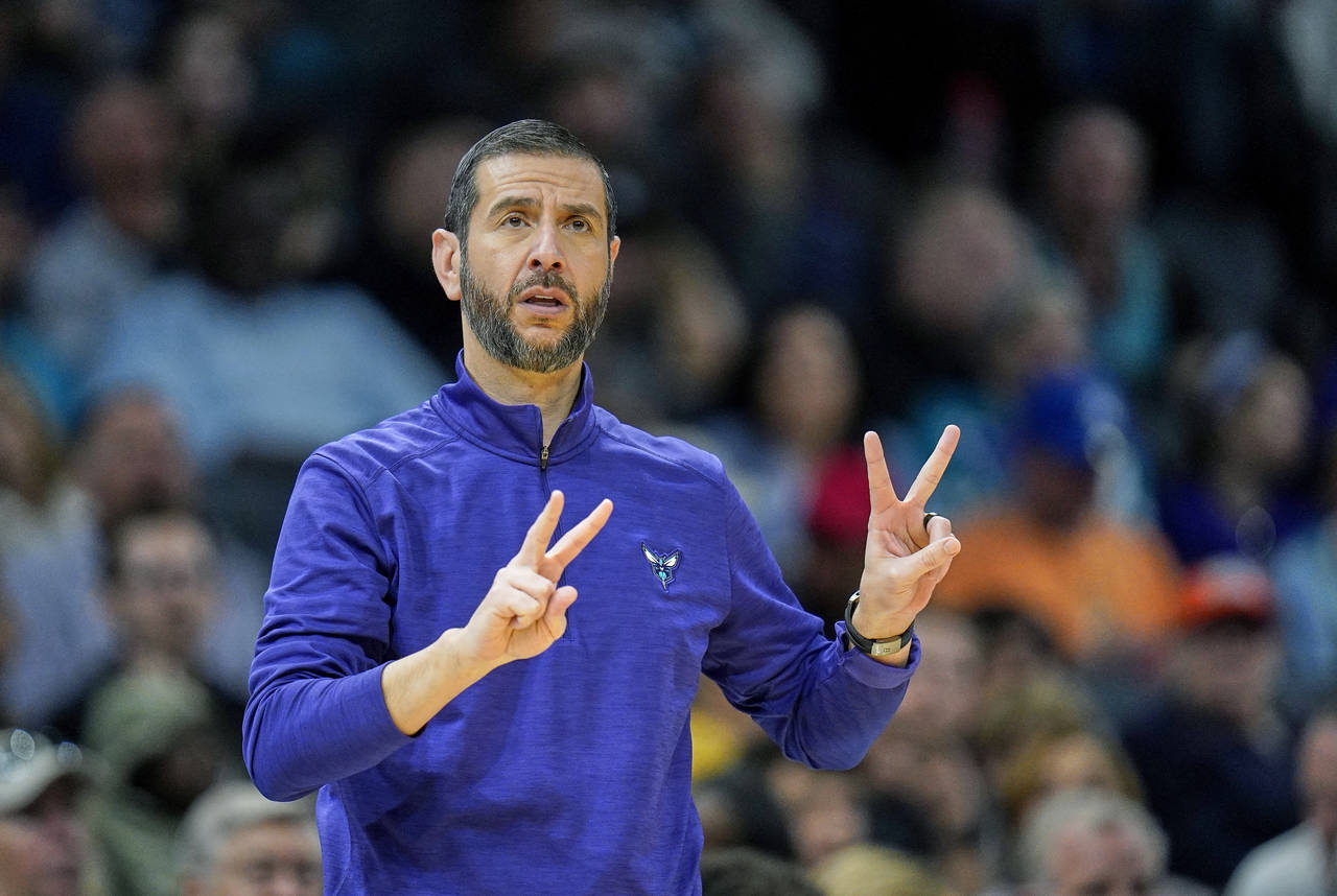 Charlotte Hornets head coach James Borrego calls a play during the first half of an NBA basketball ...