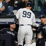 
              New York Yankees manager Aaron Boone, right, celebrates with Aaron Judge after Judge hit a home run during the fifth inning of the team's baseball game against the Cleveland Guardians on Friday, April 22, 2022, in New York. (AP Photo/Frank Franklin II)
            