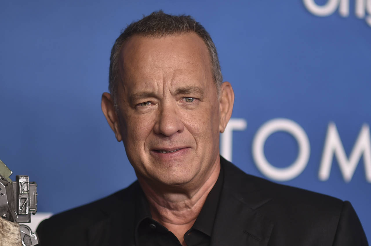 FILE - Tom Hanks arrives at the premiere of "Finch" on Tuesday, Nov. 2, 2021, at the Pacific Design...