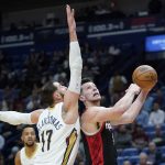 
              Portland Trail Blazers forward Drew Eubanks goes to the basket against New Orleans Pelicans center Jonas Valanciunas (17) in the first half of an NBA basketball game in New Orleans, Thursday, April 7, 2022. (AP Photo/Gerald Herbert)
            