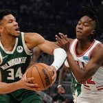 
              Milwaukee Bucks' Giannis Antetokounmpo gets past Chicago Bulls' Ayo Dosunmu during the first half of Game 5 of their NBA playoff basketball game Wednesday, April 27, 2022, in Milwaukee. (AP Photo/Morry Gash)
            