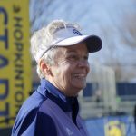 
              Val Rogosheske, who raced in the inaugural women's division in 1972, stands at the starting line of the 126th Boston Marathon, Monday, April 18, 2022, in Hopkinton, Mass. Rogosheske will run the race with her two daughters 50 years after running her first Boston marathon. (AP Photo/Mary Schwalm)
            