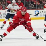 
              Detroit Red Wings right wing Filip Zadina passes during the second period of an NHL hockey game against the Florida Panthers, Sunday, April 17, 2022, in Detroit. (AP Photo/Carlos Osorio)
            