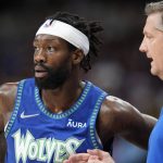 
              Minnesota Timberwolves guard Patrick Beverley, left, confers with head coach Chris Finch in the second half of an NBA basketball game against the Denver Nuggets, Friday, April 1, 2022, in Denver. (AP Photo/David Zalubowski)
            