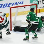 
              Minnesota Wild forward Kevin Fiala (22) scores a short-handed goal as Dallas Stars defenseman John Klingberg (3) and goaltender Scott Wedgewood (41) defend during the second period of an NHL hockey game, Thursday, April 14, 2022, in Dallas. (AP Photo/Brandon Wade)
            