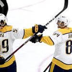 
              Nashville Predators left wing Tanner Jeannot (84) celebrates his goal against the Ottawa Senators during the third period of an NHL hockey game Thursday, April 7, 2022 in Ottawa, Ontario. (Justin Tang/The Canadian Press via AP)
            