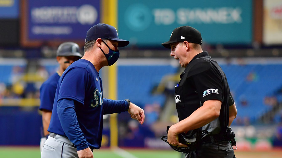 Mariners manager Scott Servais protests a call by umpire Shane Livensparger on Thursday. (Photo by ...