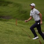 
              Will Zalatoris walks to the green on the eighth hole during the final round of the PGA Championship golf tournament at Southern Hills Country Club, Sunday, May 22, 2022, in Tulsa, Okla. (AP Photo/Sue Ogrocki)
            