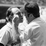 
              FILE - New York Mets coach Joe Pignatano, left, argues with first base umpire Ed Montague, right, during the fourth inning of a baseball game against the Chicago Cubs in Chicago, June 26, 1977. Pignatano, who made his major league debut with the Brooklyn Dodgers in 1957 and later was a coach for the Mets, died Monday, May 23, 2022, in Naples, Fla. (AP Photo/Larry Stoddard, File)
            