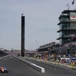 
              Scott Dixon, of New Zealand, leads the field into the first turn during the Indianapolis 500 auto race at Indianapolis Motor Speedway, Sunday, May 29, 2022, in Indianapolis. (AP Photo/Darron Cummings)
            