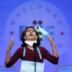 
              Ananya Rao Prassanna, 11, from Omaha, Neb., reacts as she competes during the Scripps National Spelling Bee, Tuesday, May 31, 2022, in Oxon Hill, Md. (AP Photo/Alex Brandon)
            