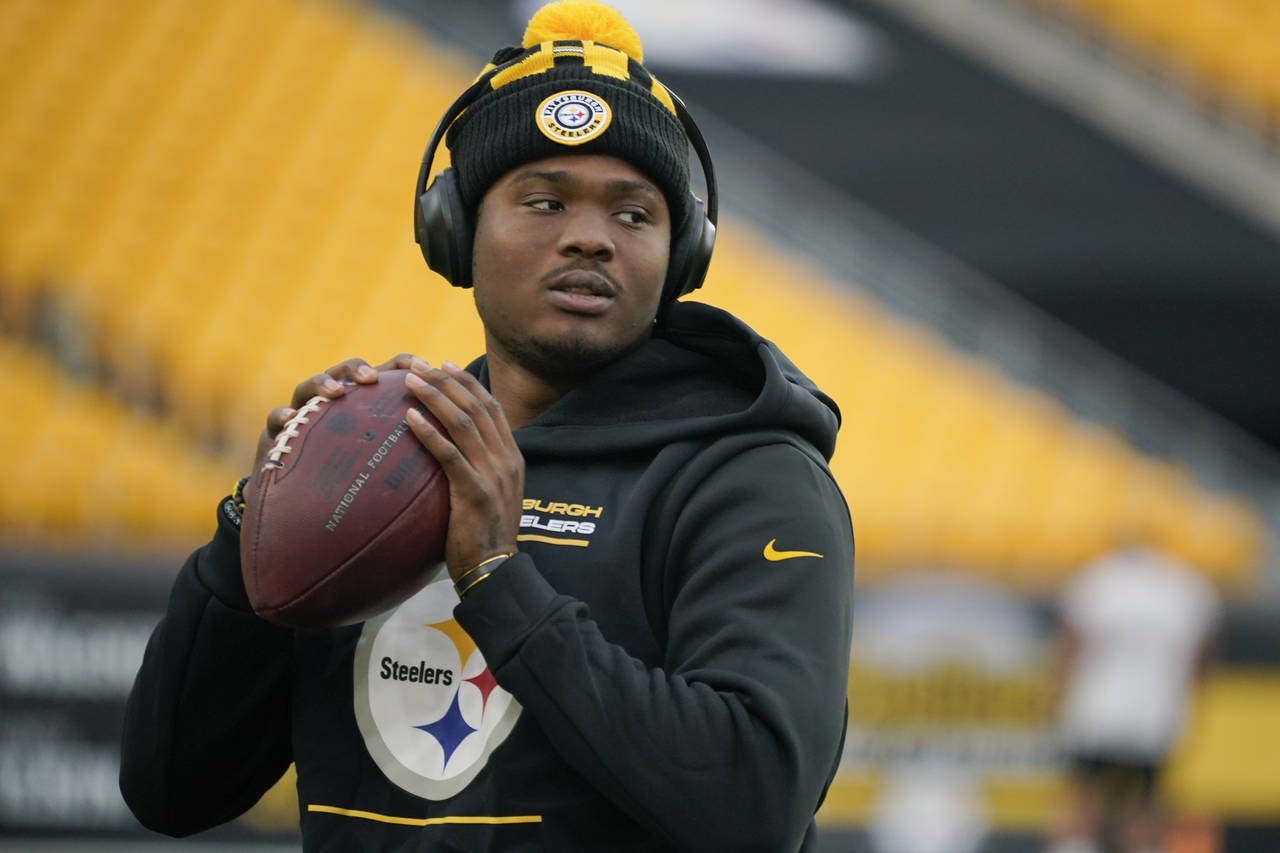 FILE - Pittsburgh Steelers quarterback Dwayne Haskins warms up before an NFL football game against ...