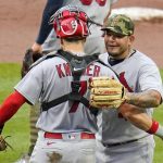 
              St. Louis Cardinals relief pitcher Yadier Molina, right, celebrates with catcher Andrew Knizner after getting the final out of a baseball game against the Pittsburgh Pirates in Pittsburgh, Sunday, May 22, 2022. (AP Photo/Gene J. Puskar)
            