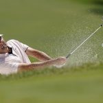 
              Scottie Scheffler hits from a bunker on the seventh hole during the second round of the Charles Schwab Challenge golf tournament at the Colonial Country Club, Friday, May 27, 2022, in Fort Worth, Texas. (AP Photo/LM Otero)
            