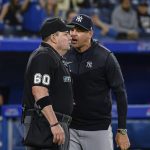 
              New York Yankees manager Aaron Boone argues with home plate umpire Marty Foster during the eighth inning of the team's baseball game against the Toronto Blue Jays on Wednesday, May 4, 2022, in Toronto. (Christopher Katsarov/The Canadian Press via AP)
            